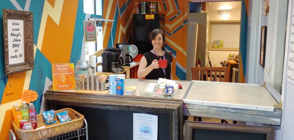 This image has an empty alt attribute; its file name is TRU-Thrift-Cafe-Volunteer-Kimberly-1024x488.jpg