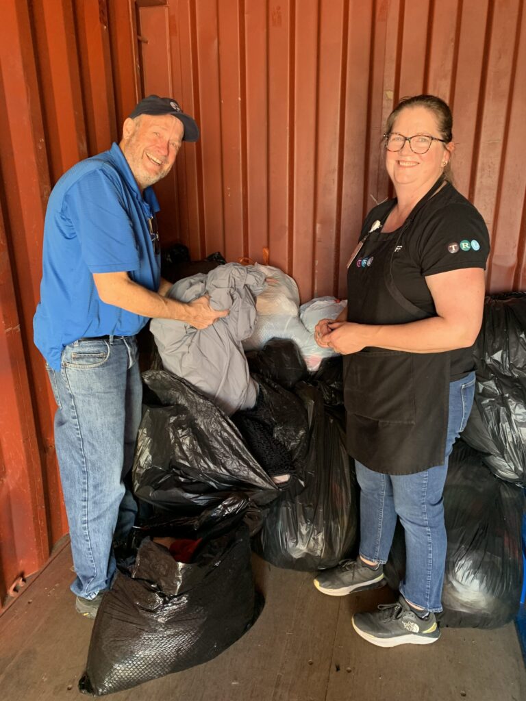 Paul, TRU Thrift Shop shopper, picking up textiles for a Kiwanis project to make dog toys for the Humane Society in partnership with CU students.
